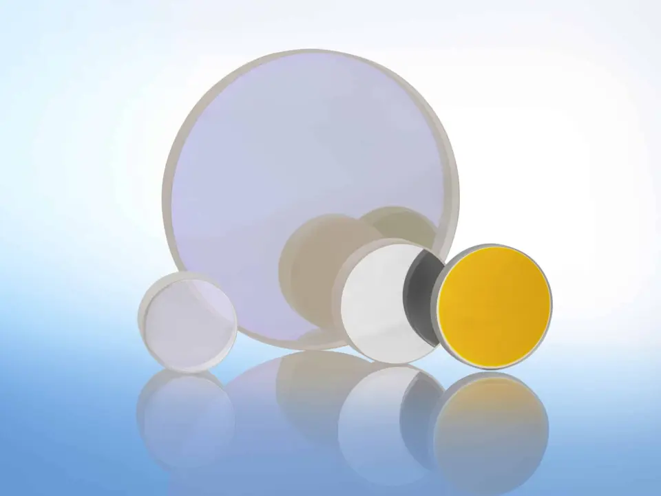 PVD coating of optical lenses